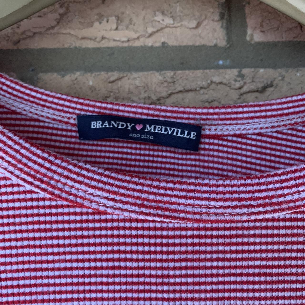 Brandy Melville red stripe alien logo top. Sizing... Depop