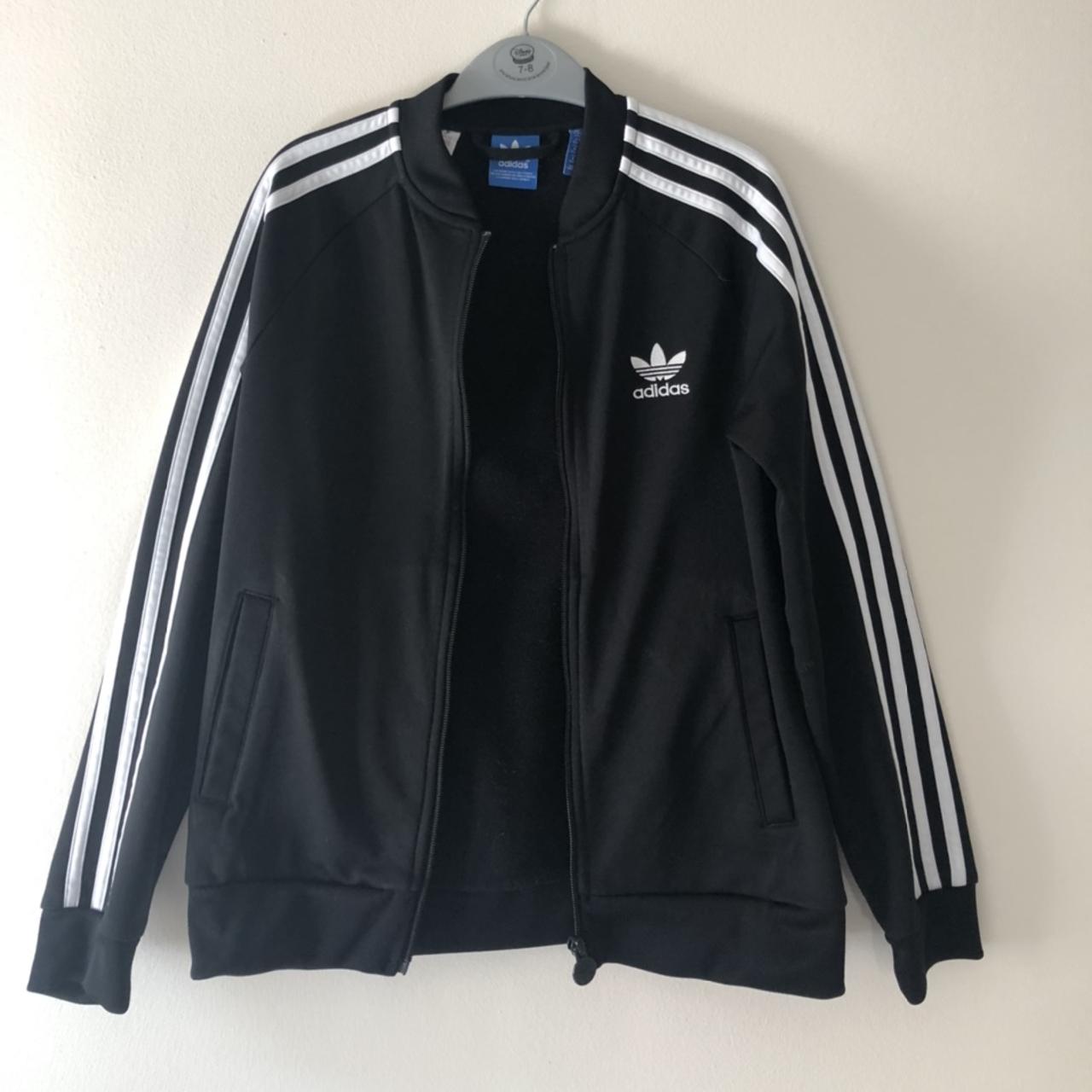 Black Adidas zip-up jacket with white stripes Good... - Depop