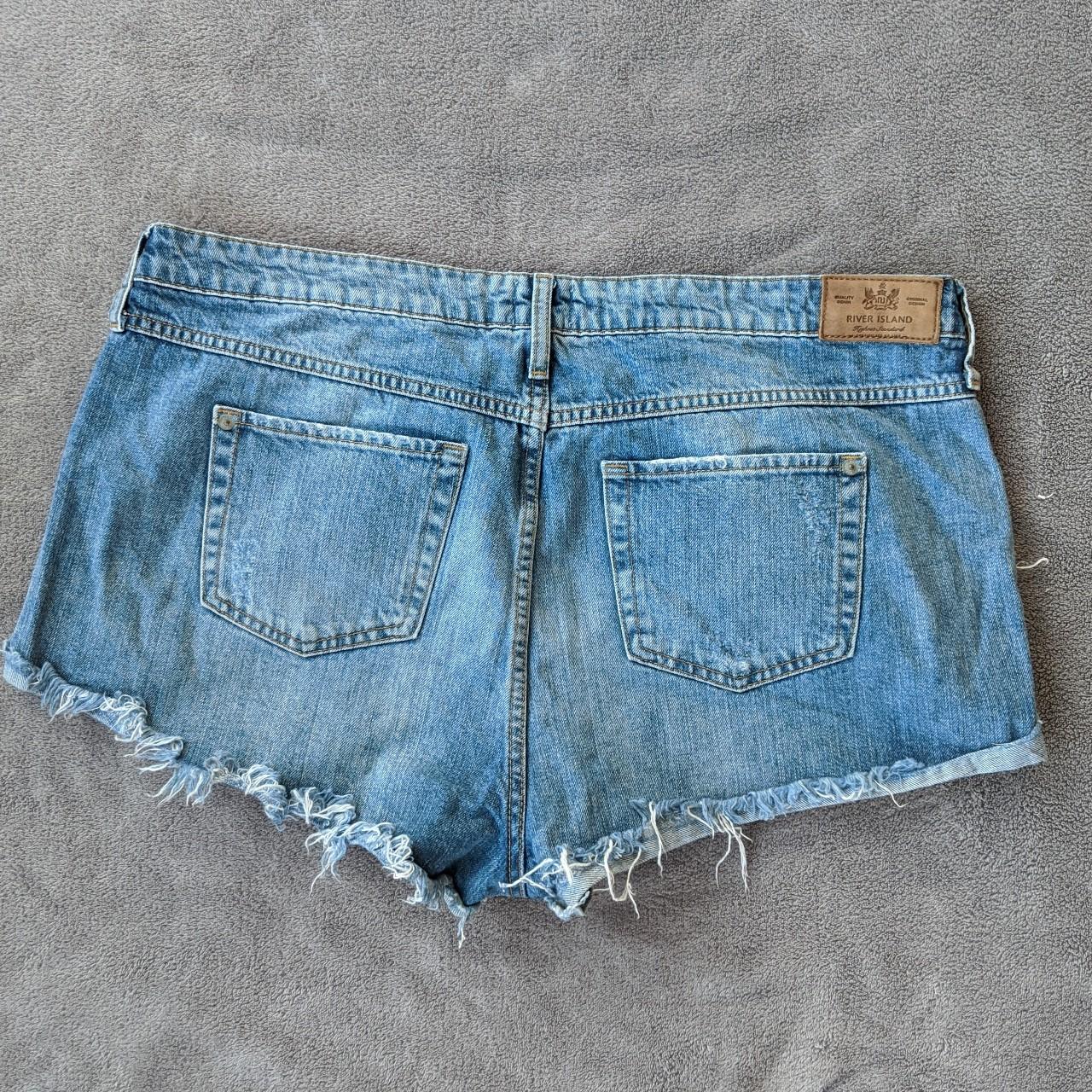 River Island faded blue denim shorts with rips and... - Depop