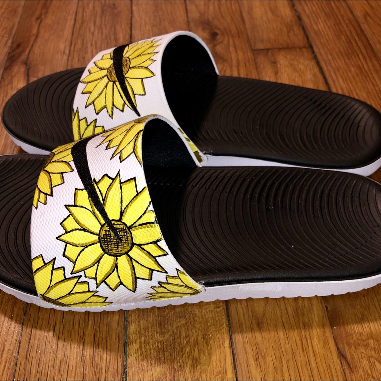 white nike sandals with sunflowers