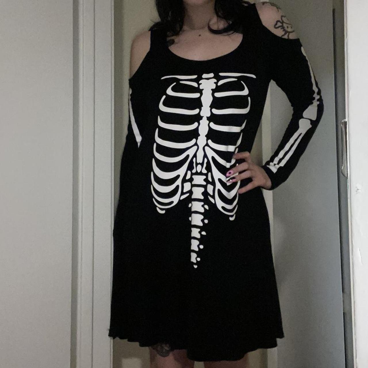 Skeleton dress with shoulder cut outs! A little see... - Depop