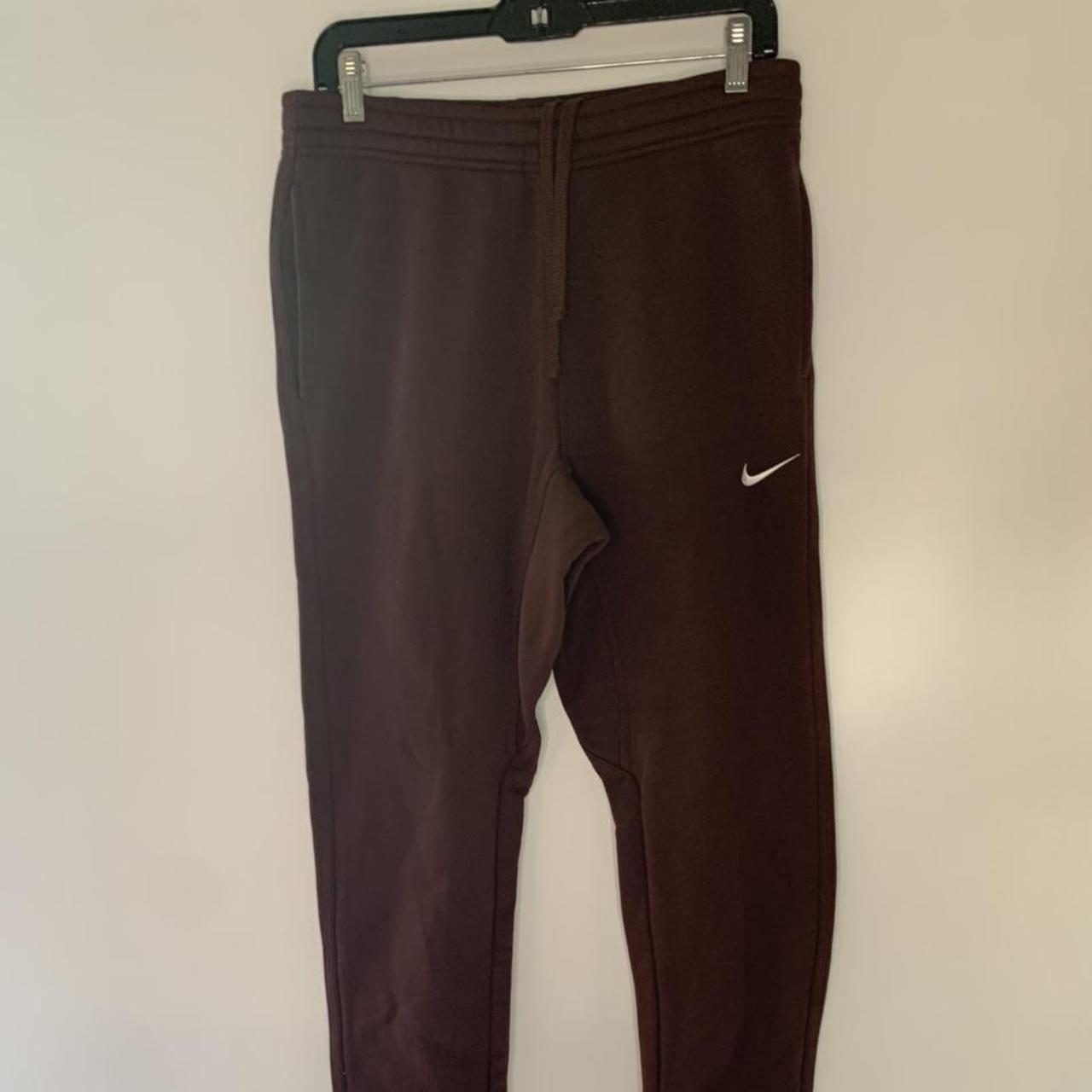 Brand new chocolate brown Nike sweatpants, cuffed on... - Depop