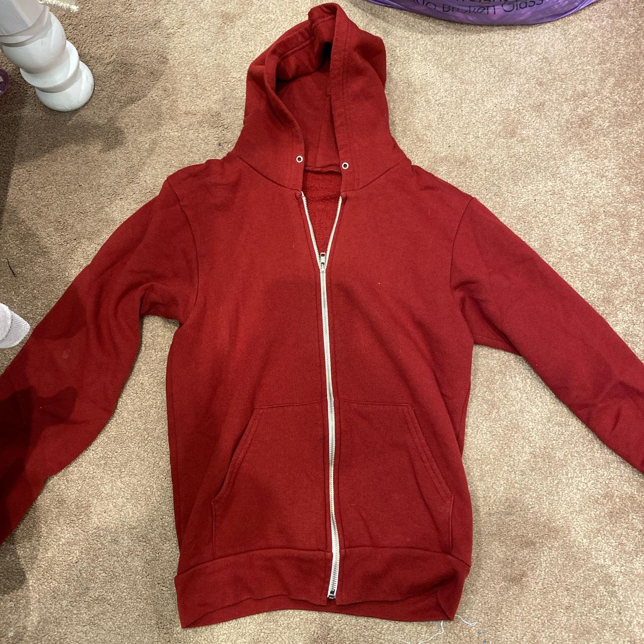 american apparel zip up hoodie in red. would fit... Depop