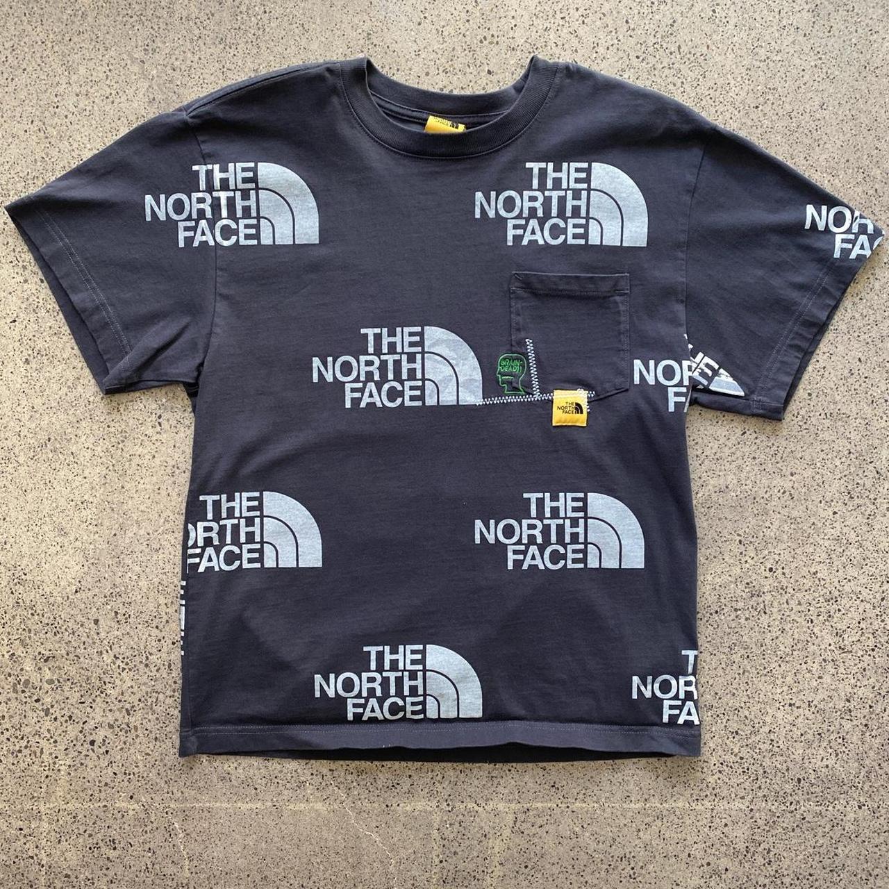 brain dead north face tee