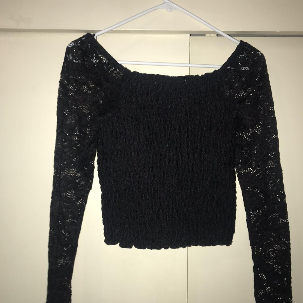 Black top with lace sleeves only worn once so it has... - Depop