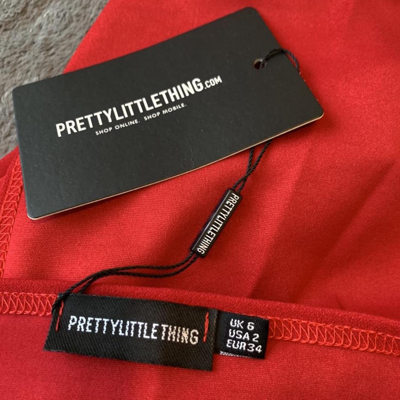 Pretty little thing red jumpsuit with wide legs... Depop