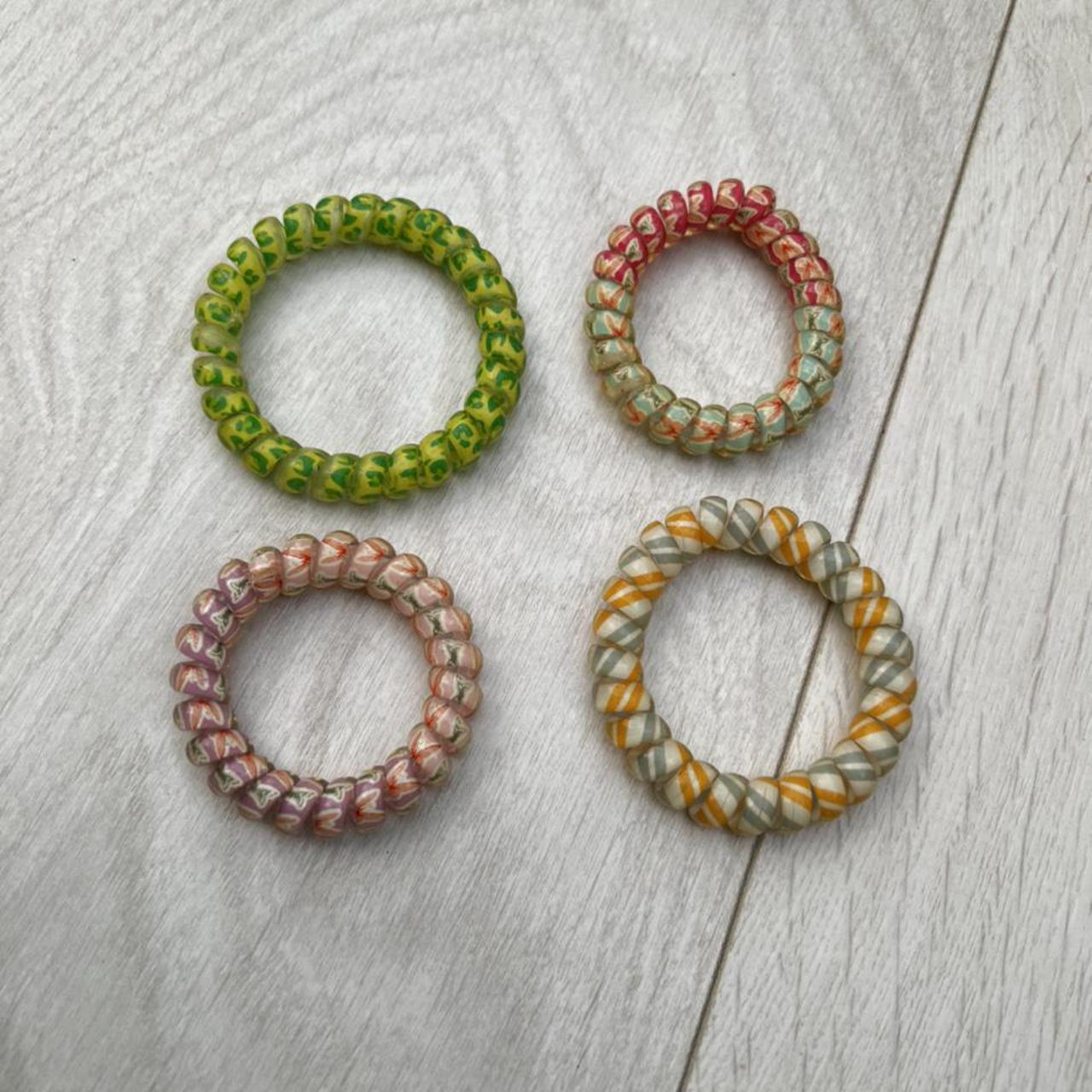 mix of spiral hair bands listing is for all... Depop