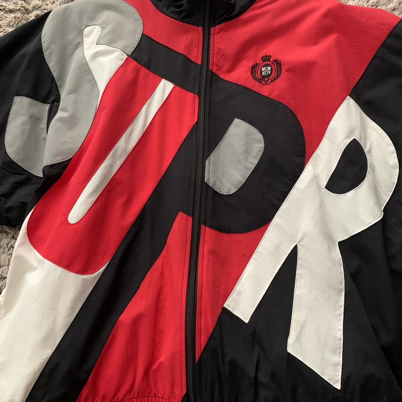 Big letter best sale track jacket supreme