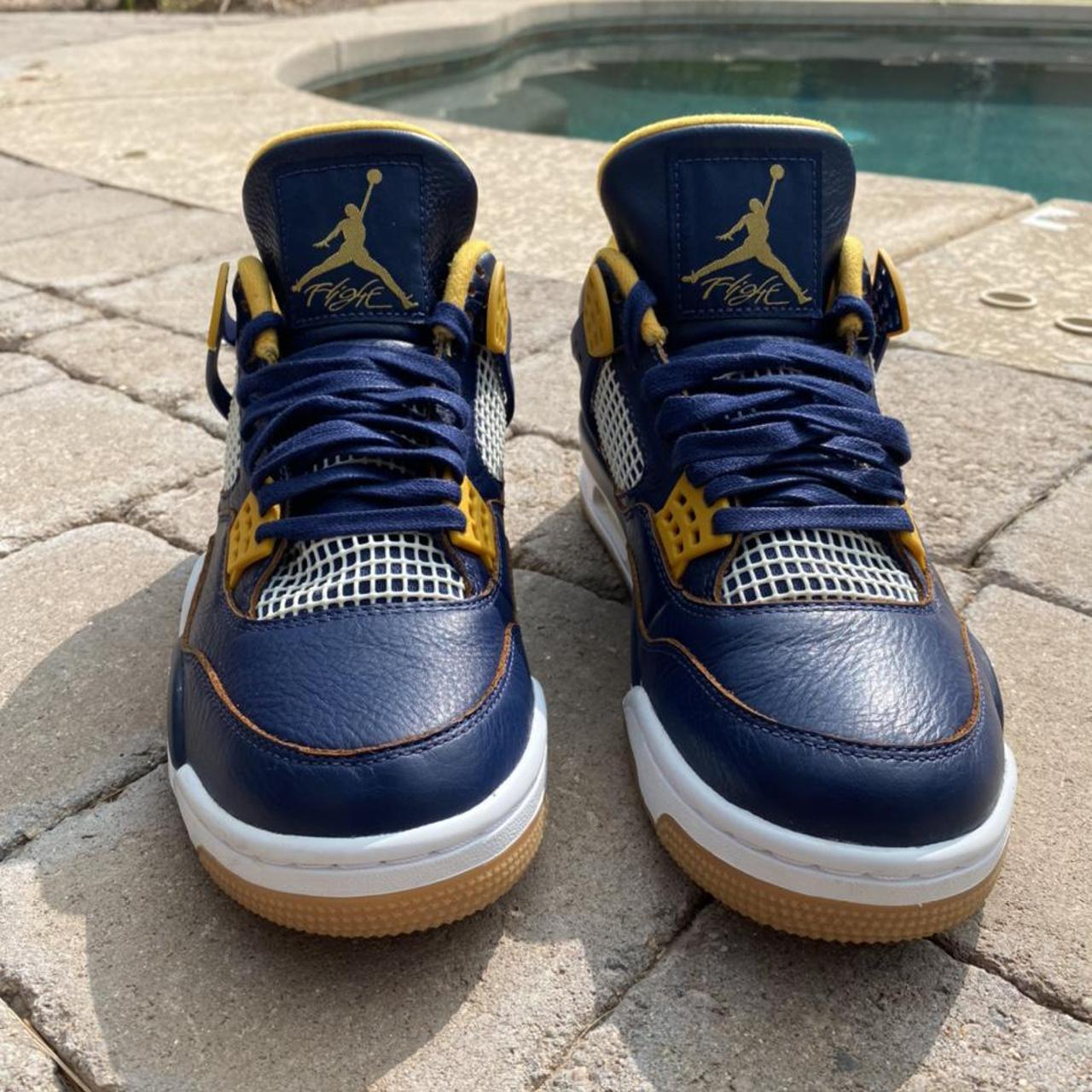 yellow and navy blue jordan 4