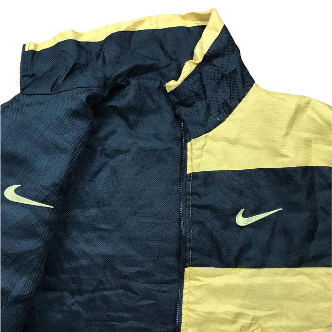 Nike Padded Jacket in Yellow and Black with big... - Depop