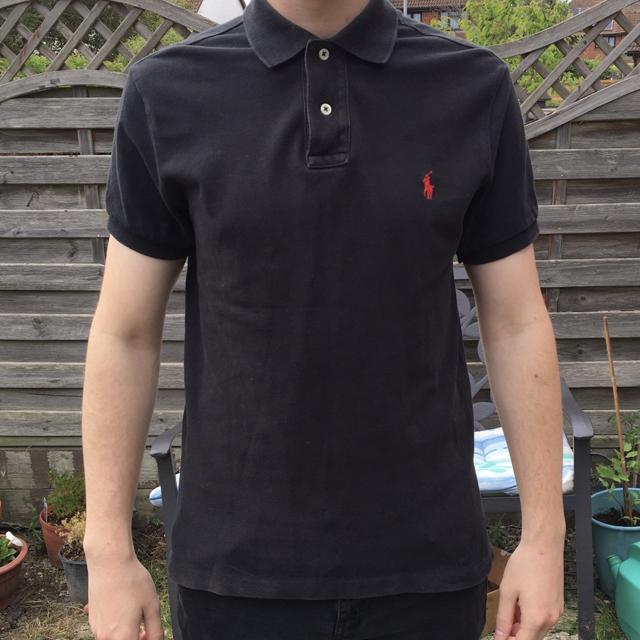 Ralph lauren polo shirt. Black with red logo. Warn a