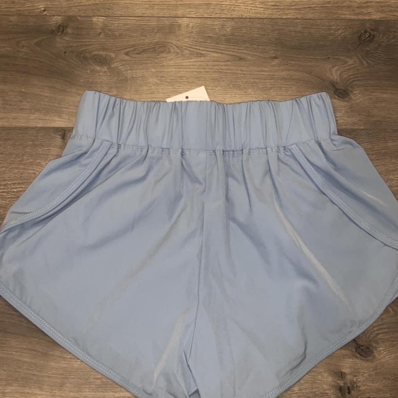 Brand new blue Halara shorts. Never worn (with tags)... - Depop