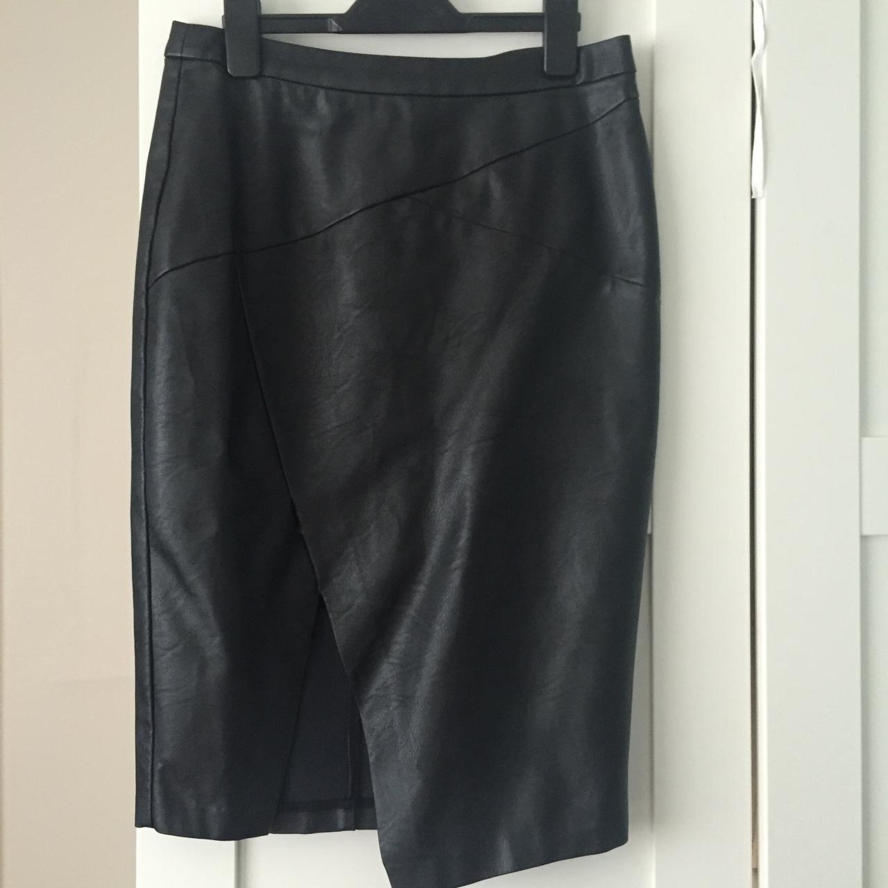Oasis leather wrap skirt in size 10. Slight tear in... - Depop