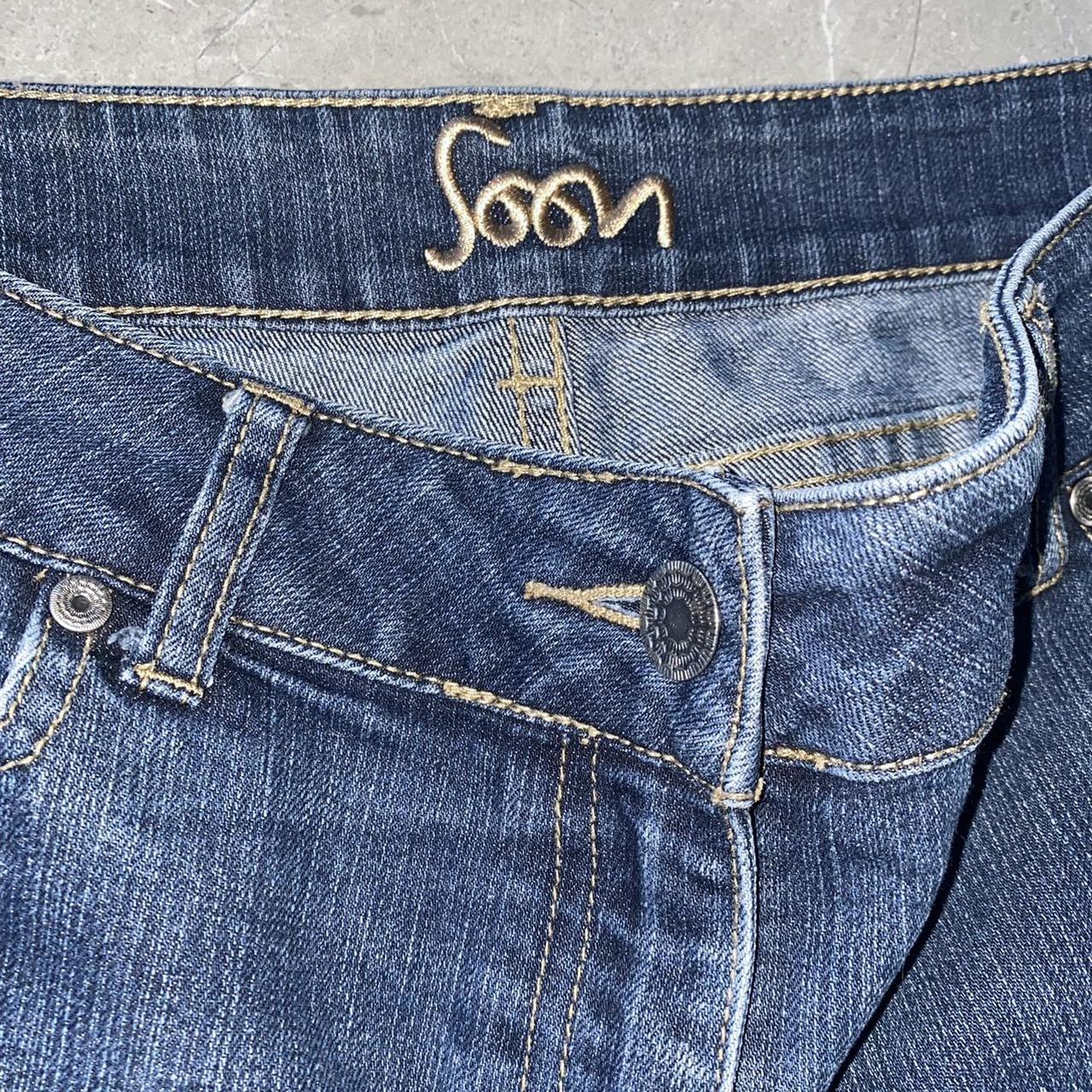 Y2k flared jeans with diamanté’s on the back pockets... Depop