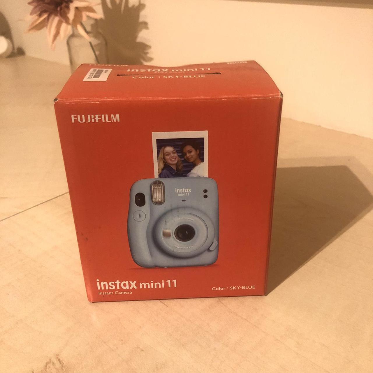 how do you reset a polaroid instax mini 11