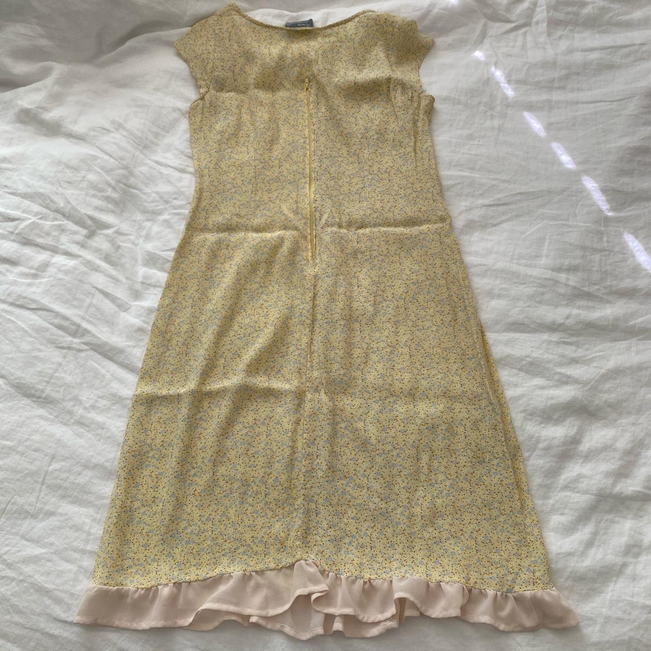 beautiful floral dress. Inseams seem to be weak from... - Depop