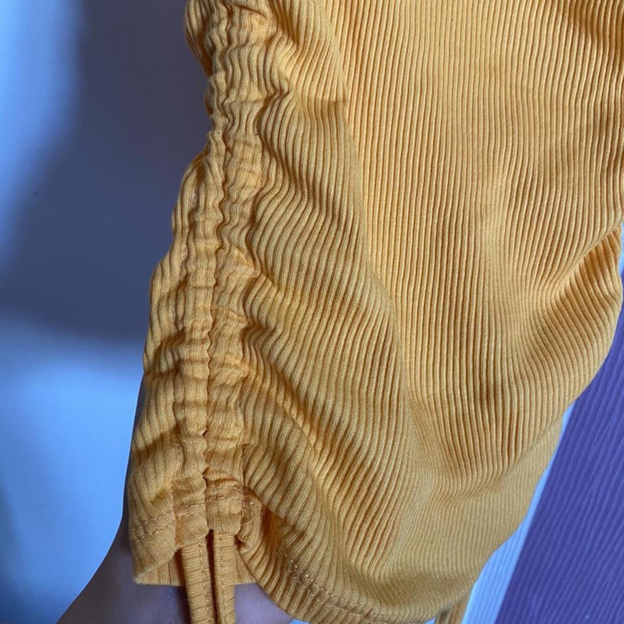 yellow/ orange crop top H&M would fit sizes 6/8... Depop