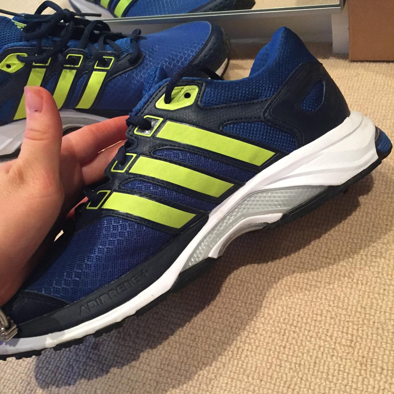 adidas trainers blue with yellow stripes