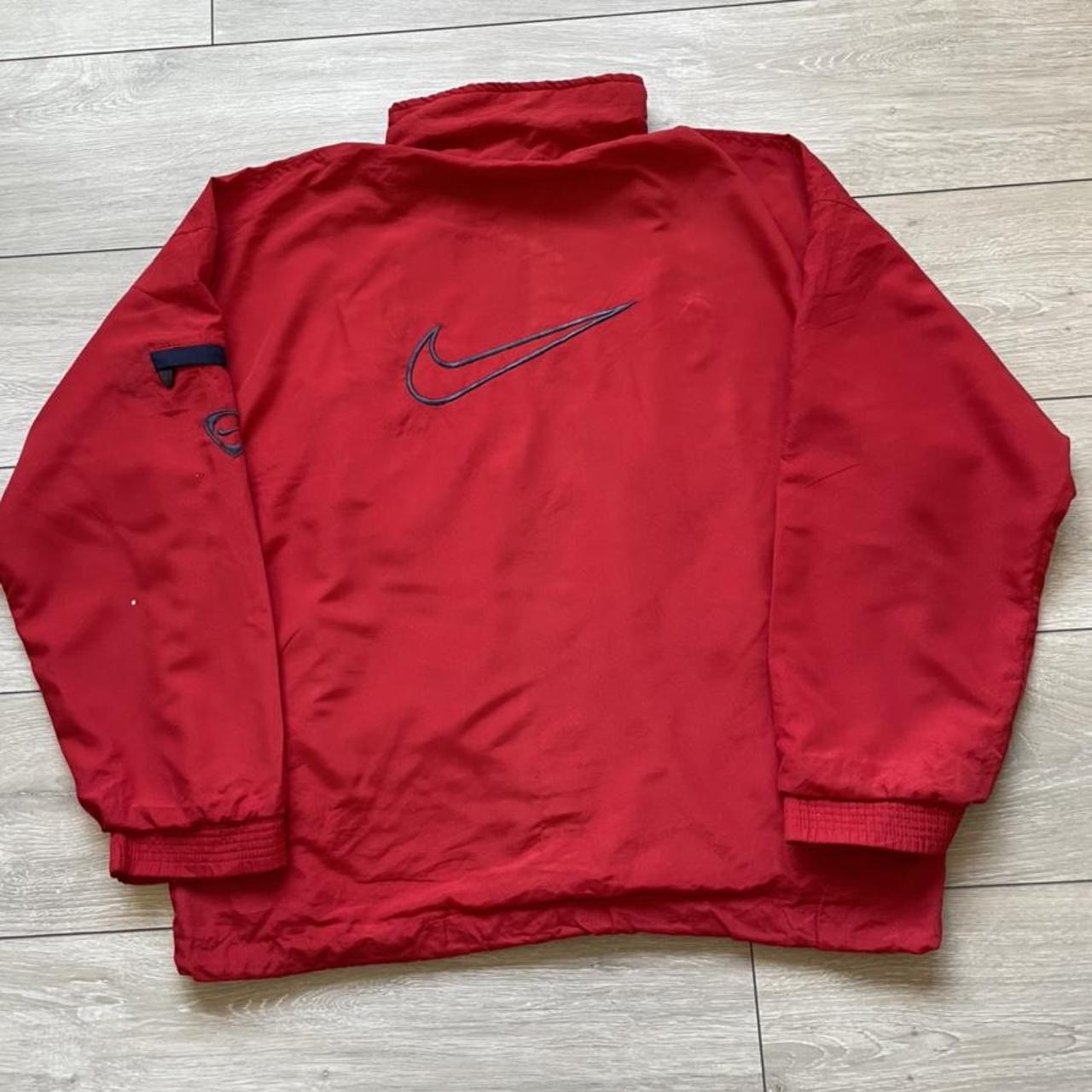 red nike swoosh jacket