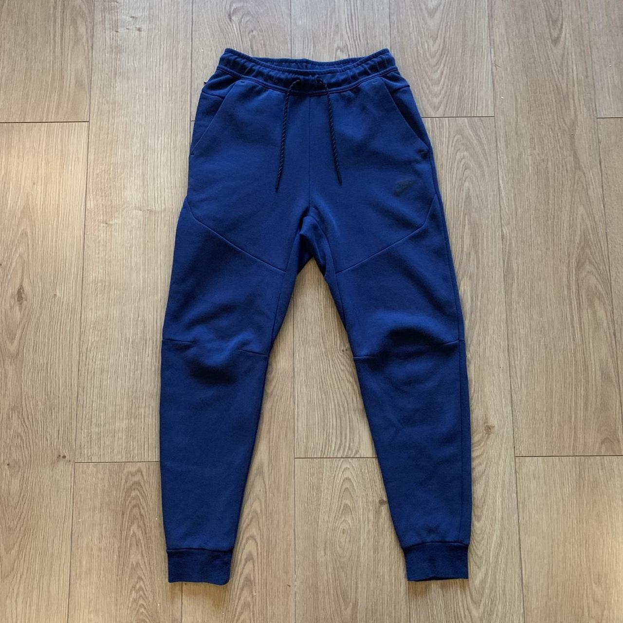 nike tech joggers navy blue