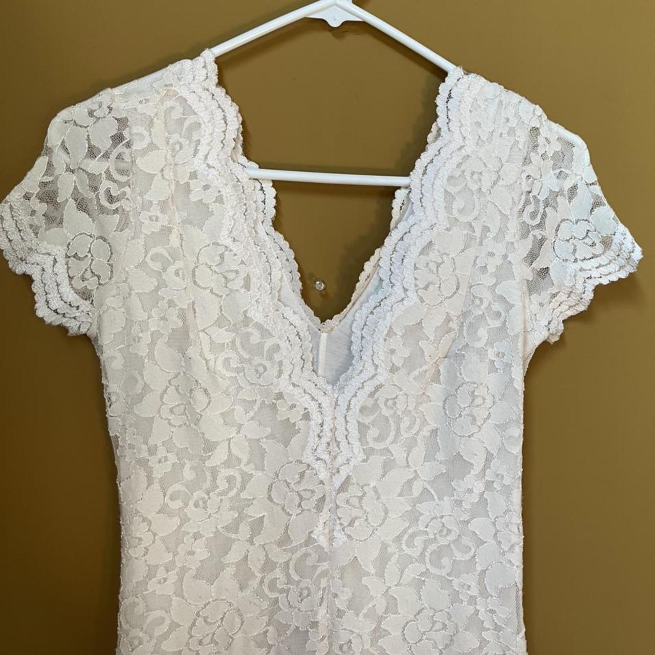 White lace minidress with a deep V - neck in the... - Depop