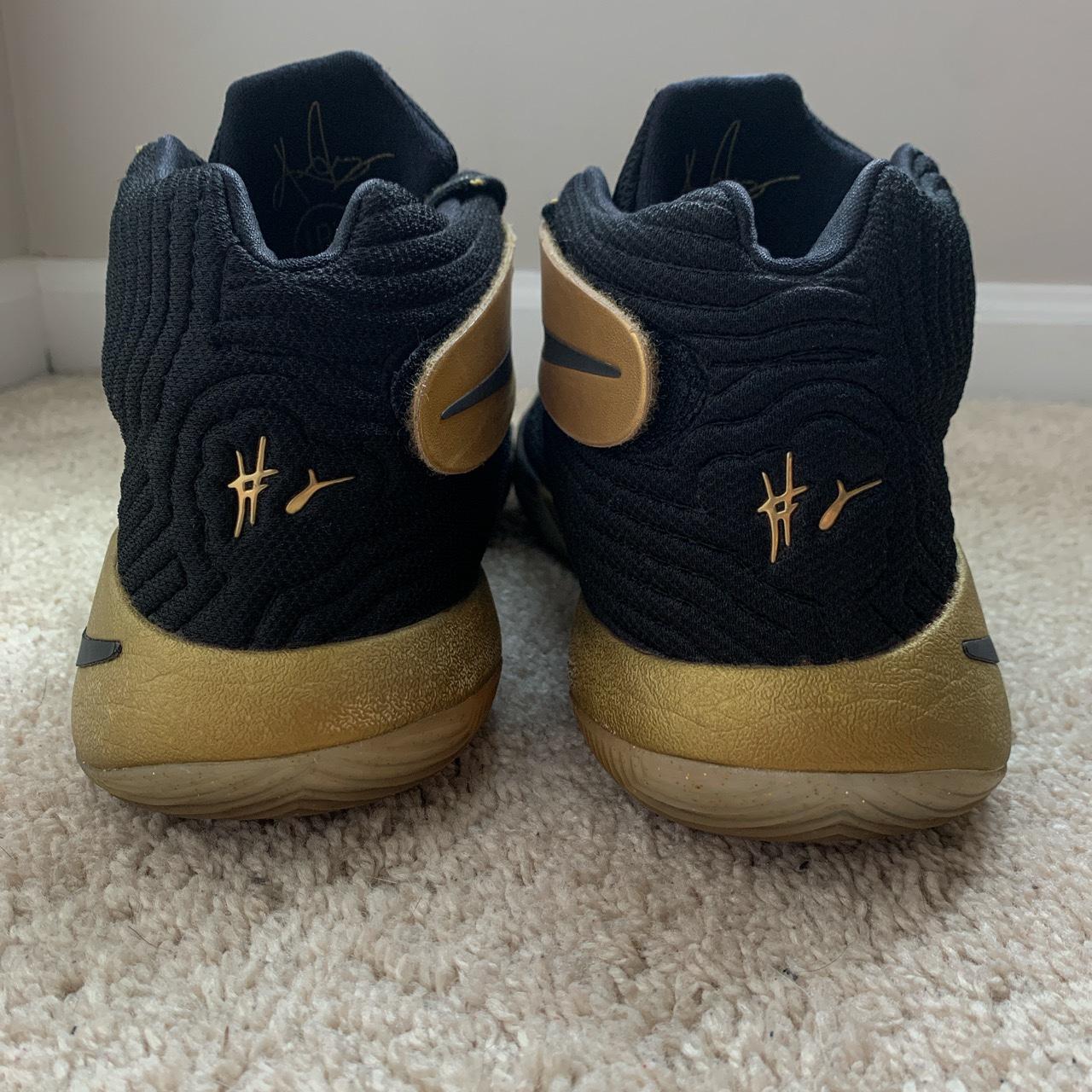 kyrie irving shoes 4 black and gold