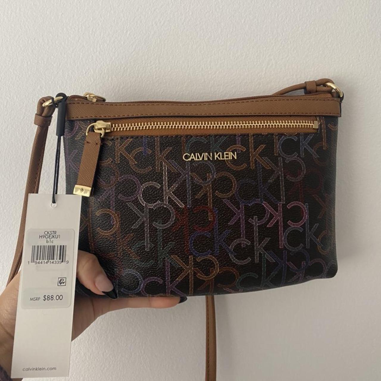 Calvin Klein sling bag with tags