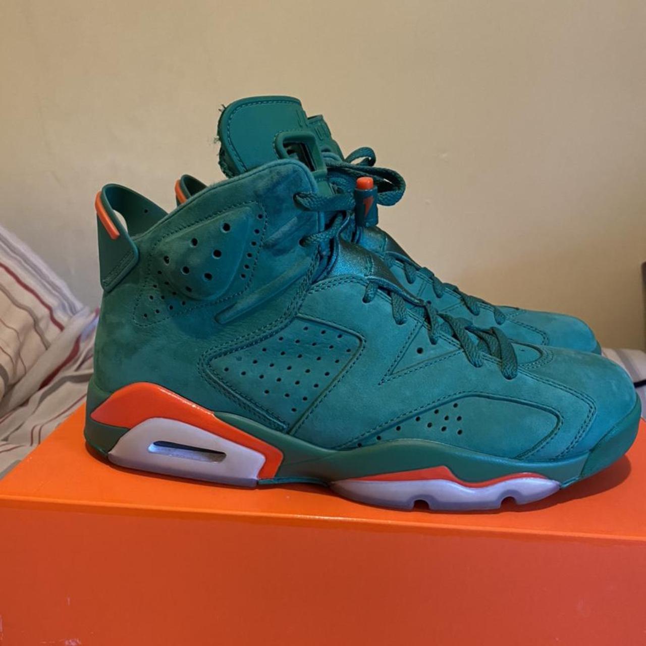 green and orange jordans 6