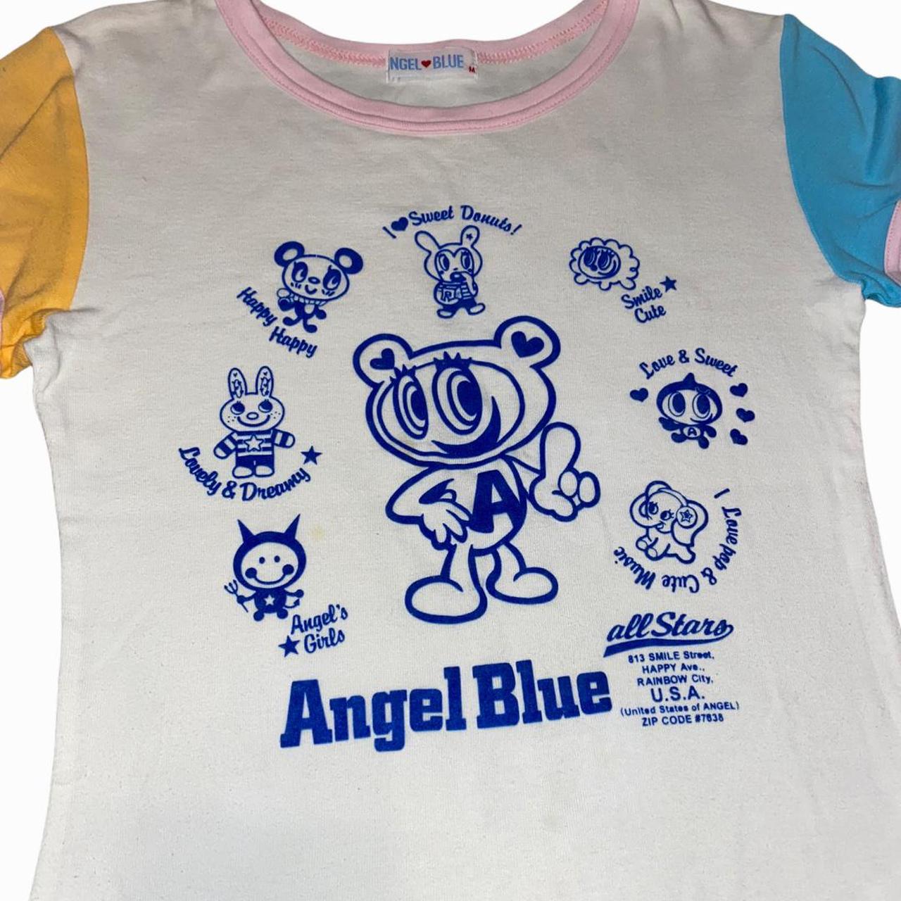 Angel blue japan TShirt. Has a small mark on the... Depop