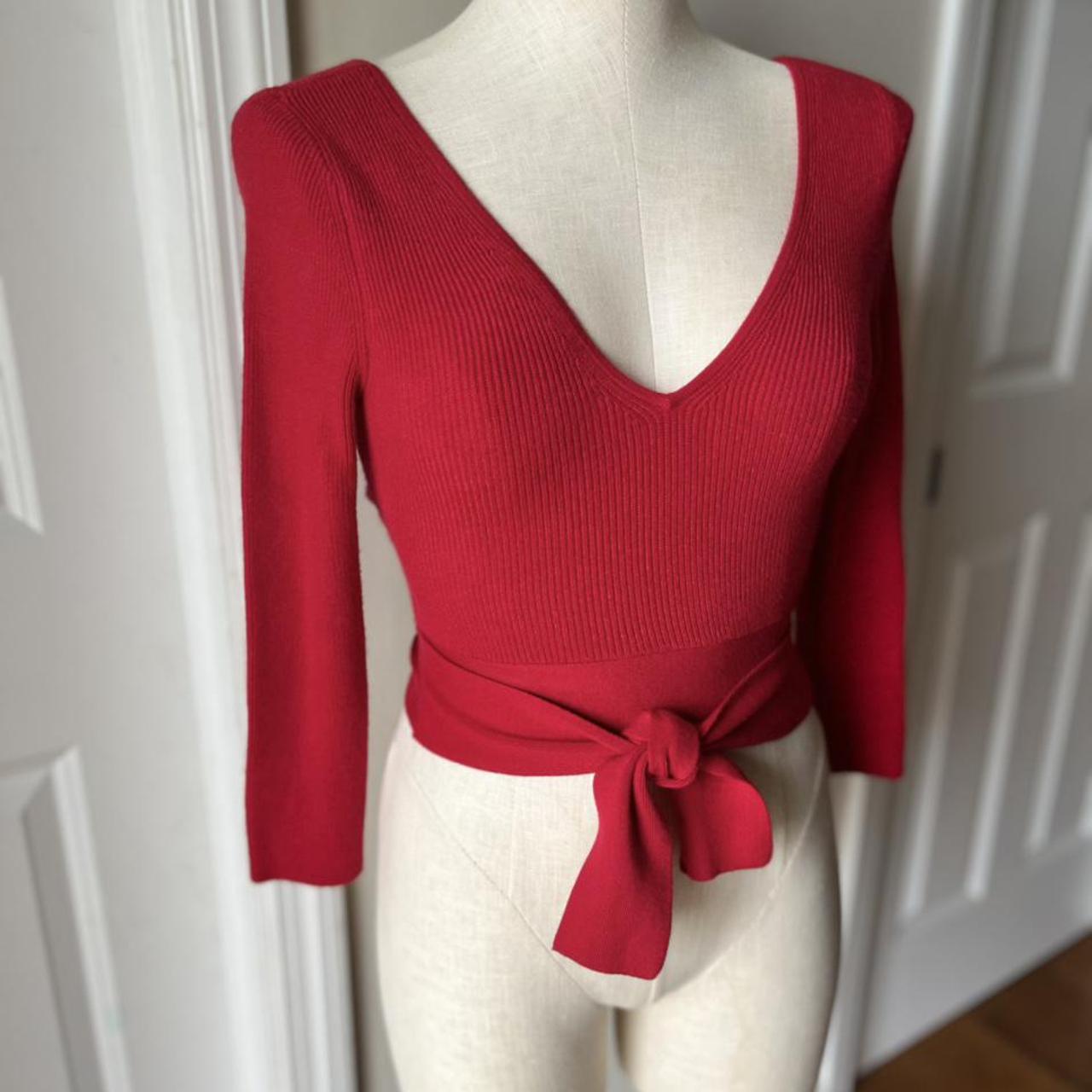 Express Red Vneck Sweater with ties around the... Depop