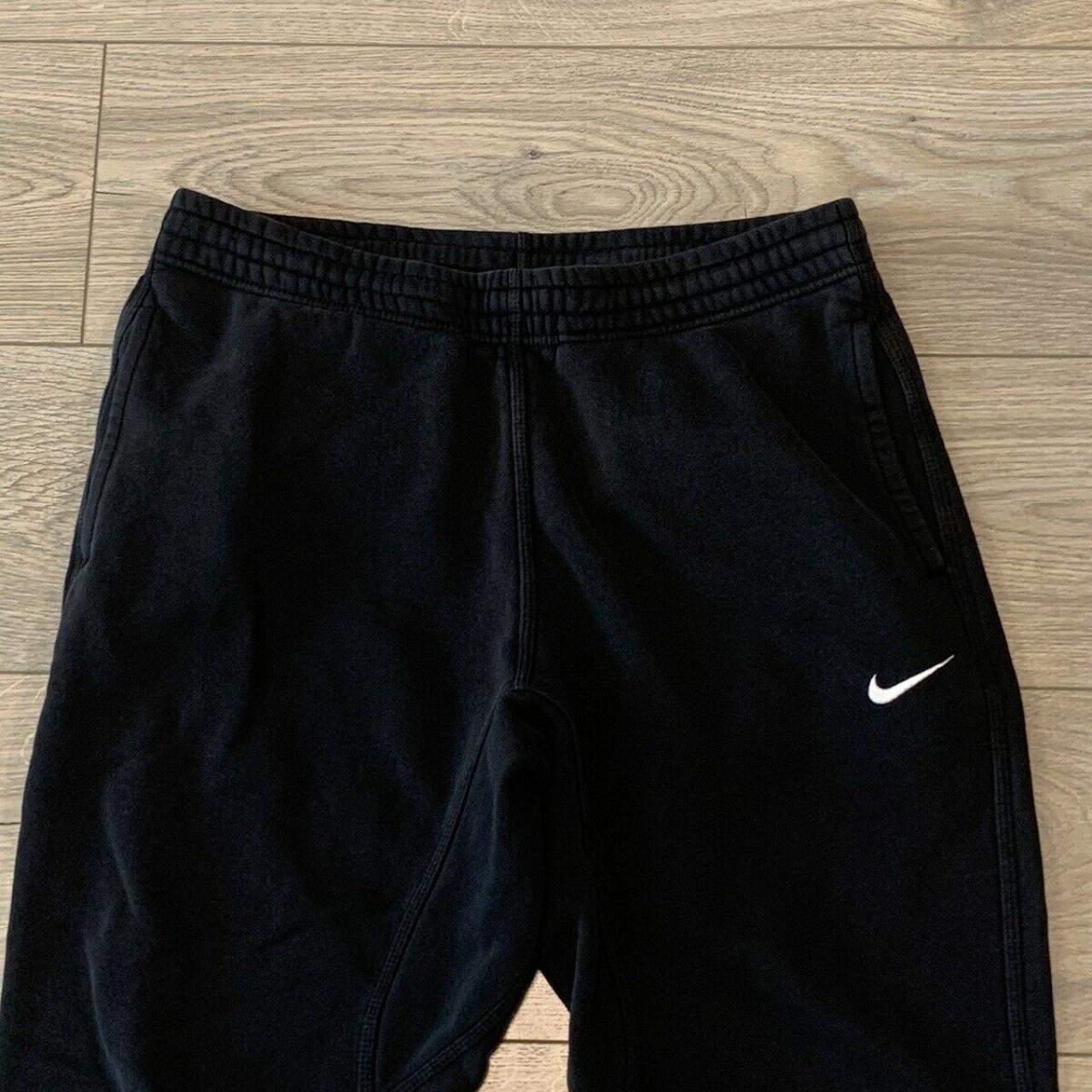 nike club fleece tapered joggers