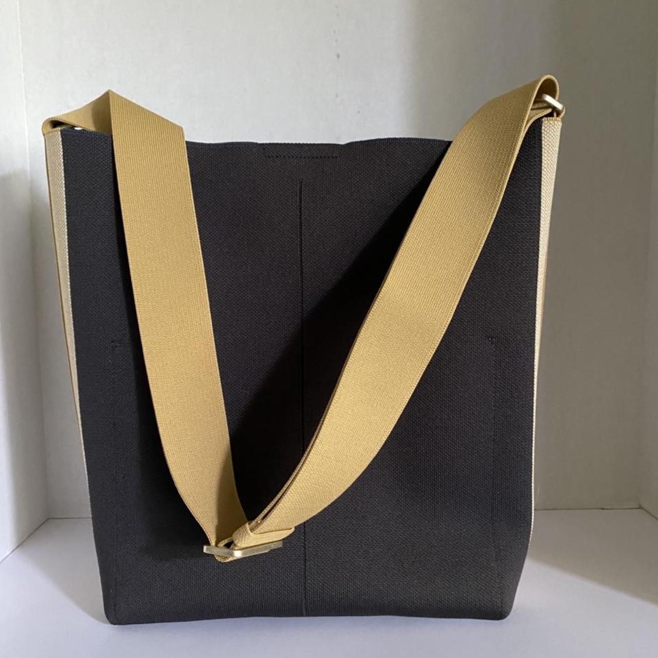 Rothy’s “The Bucket Bag” in Ink & Ivory color.... Depop