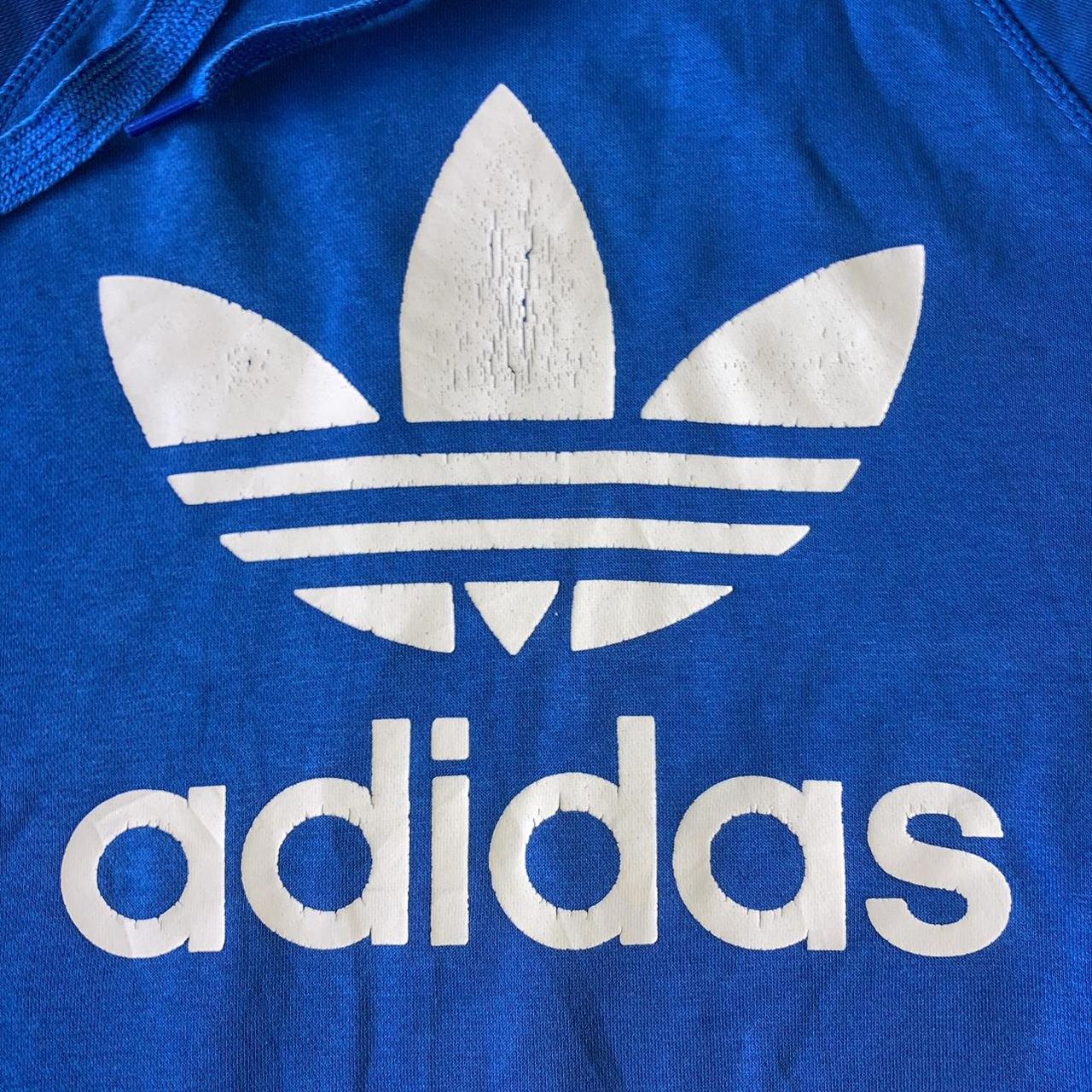 Adidas blue and white Classic hoodie with large... - Depop