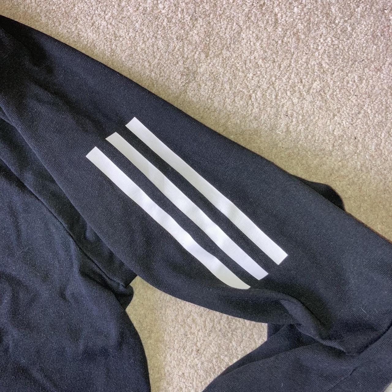 Classic Adidas black and white hoodie with a... - Depop