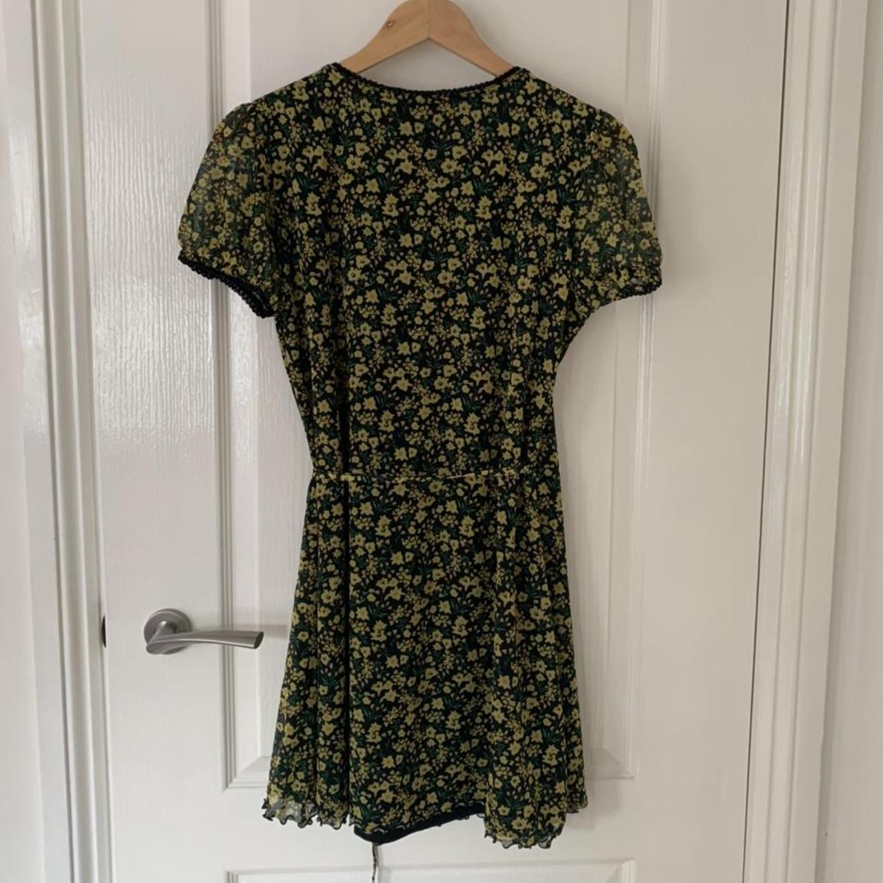 gorgeous green and yellow floral mini wrap dress... - Depop