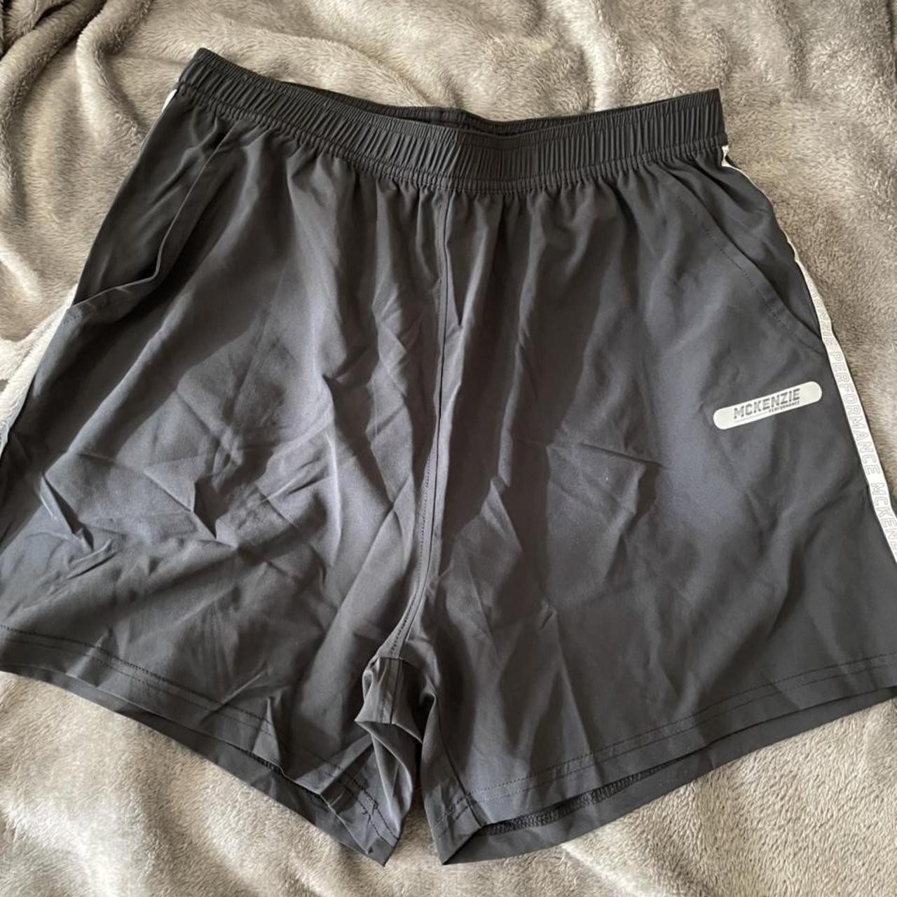 McKenzie Performance black sports shorts Condition:... - Depop