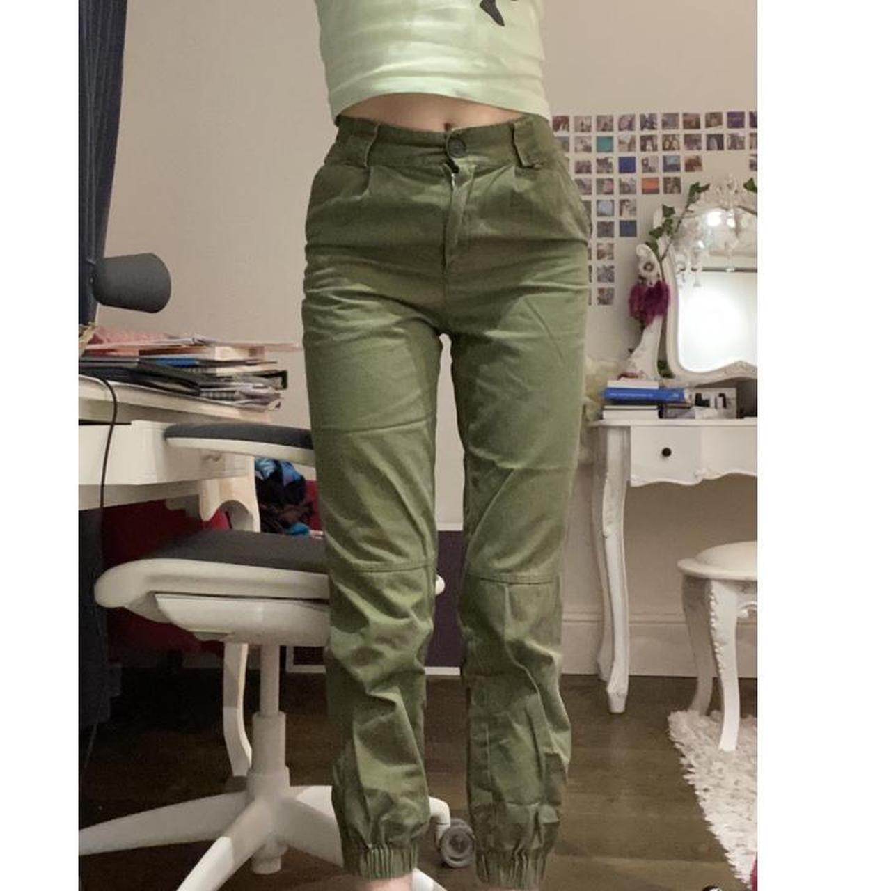 Khaki green cargo trousers. The material is on the... - Depop