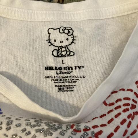 white Hello Kitty design t-shirt with four tiny - Depop