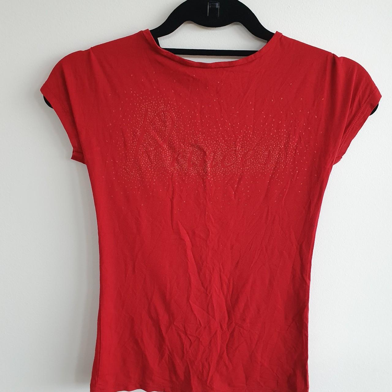 Funky red tee from Italian brand Sisley with a... - Depop