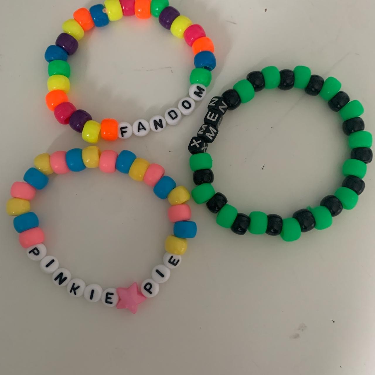 Top 2 pictures are all the kandi bracelets i made JUST tod…