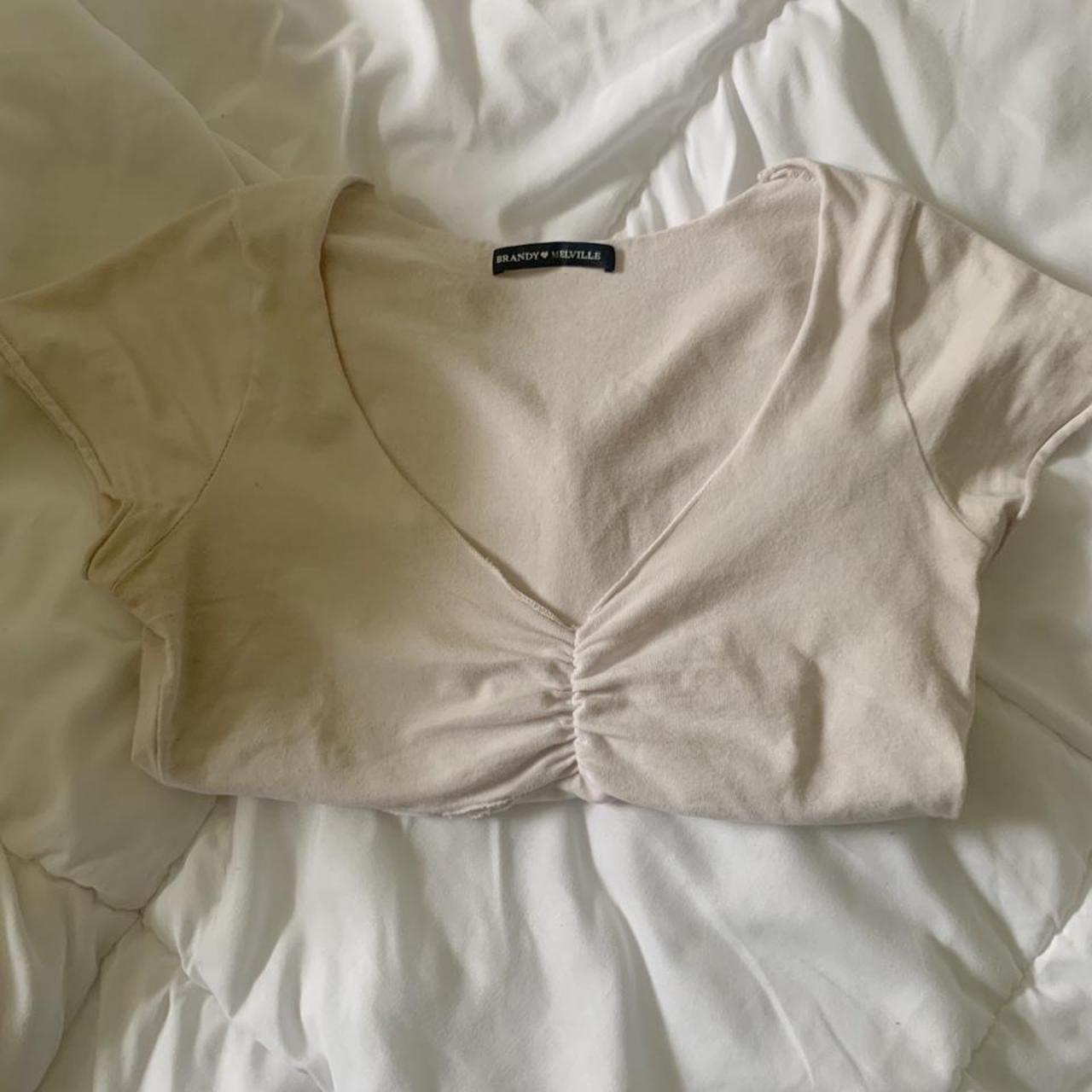 brandy melville gina top! tear in the seam could... Depop