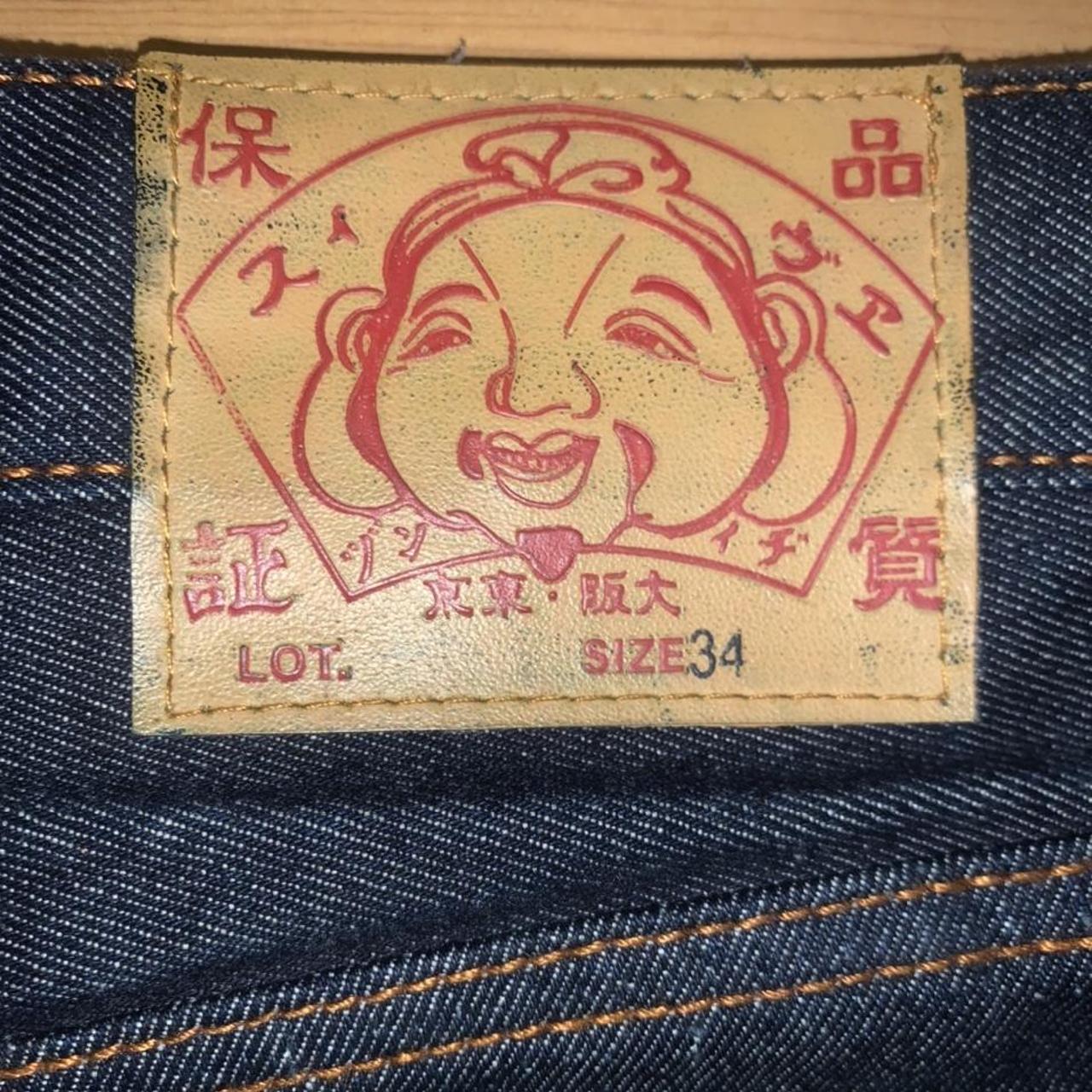 Rare Evisu print Jeans. Red and yellow stitching is