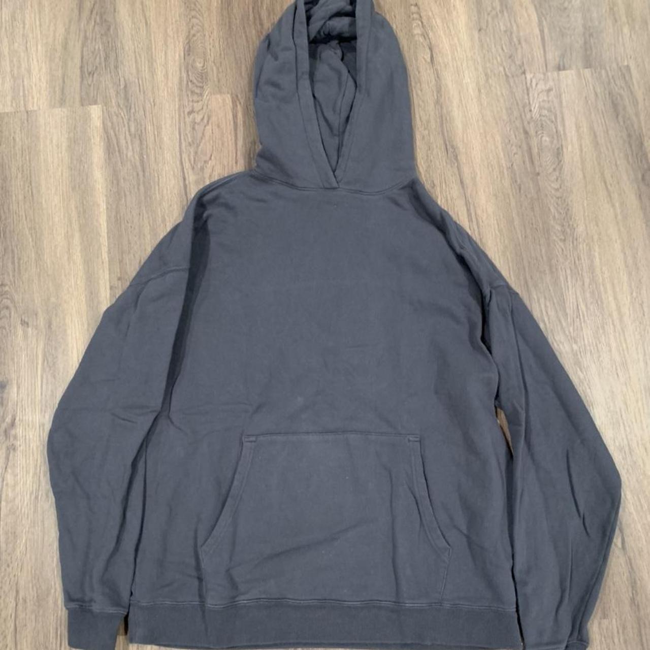 Blank hoodie size medium, kind of a blue-ish... - Depop