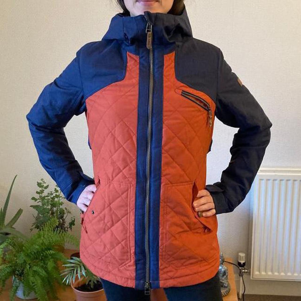 Orange and store blue ski jacket