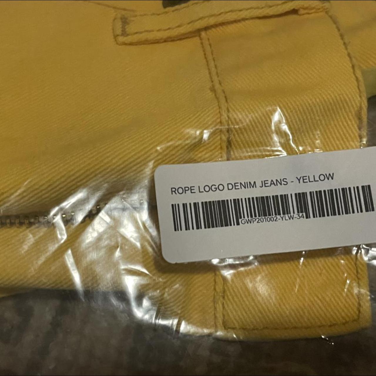 Yellow Rope Logo Denim Jeans - Golf Wang, Way too...