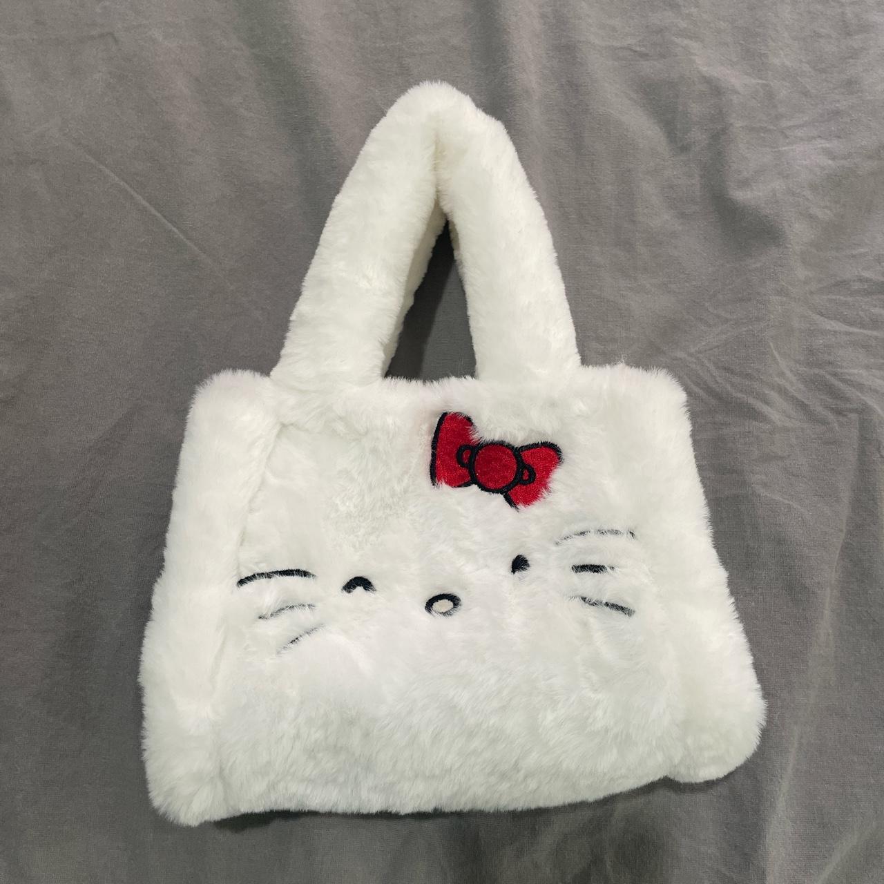 It’s a fluffy hello kitty bag! Honestly so cute!... - Depop