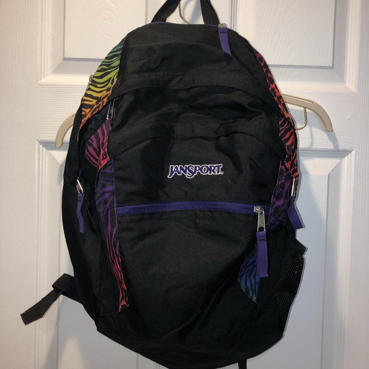 Black Jansport backpack with rainbow animal print
