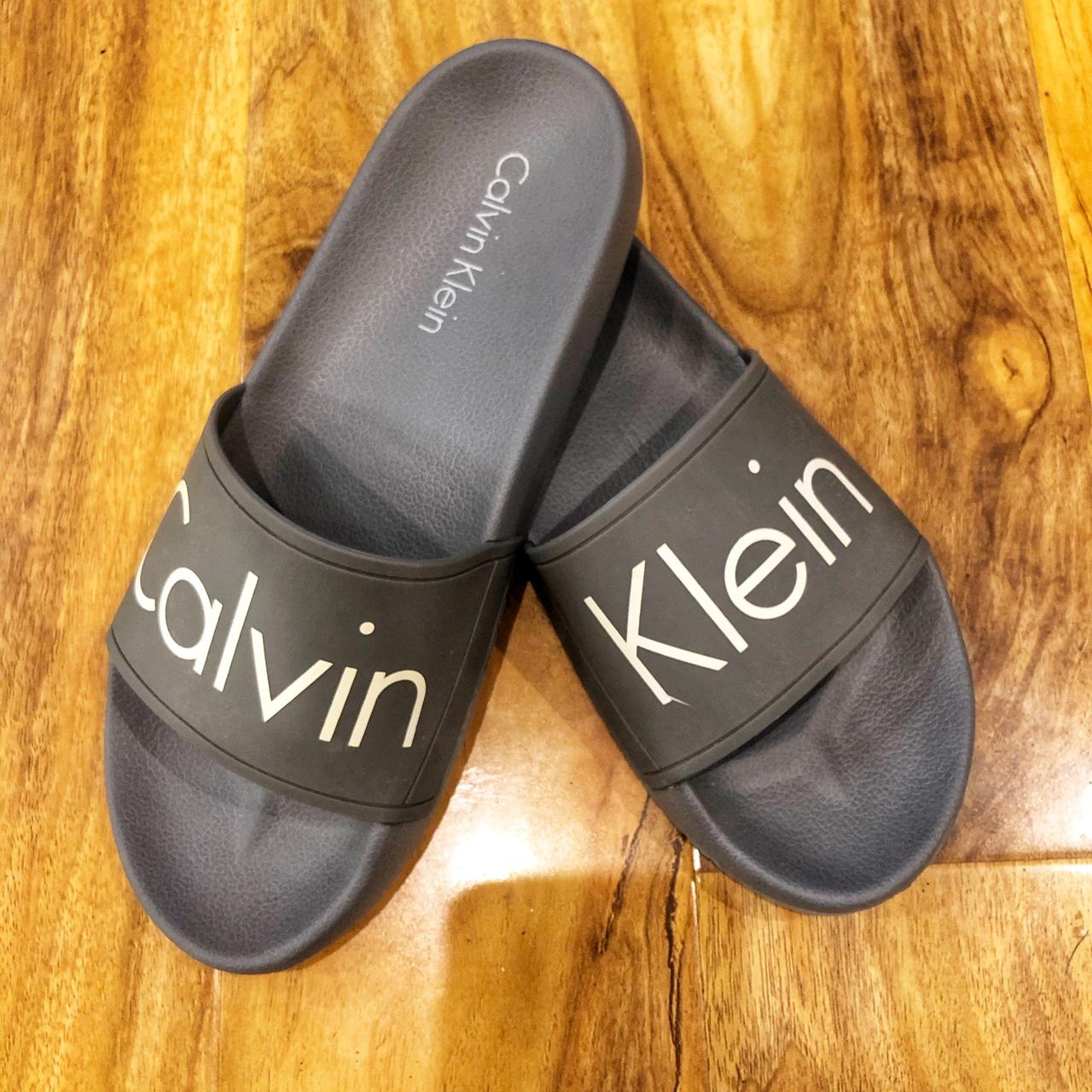 Calvin Klein grey sliders. Worn once in fantastic Depop