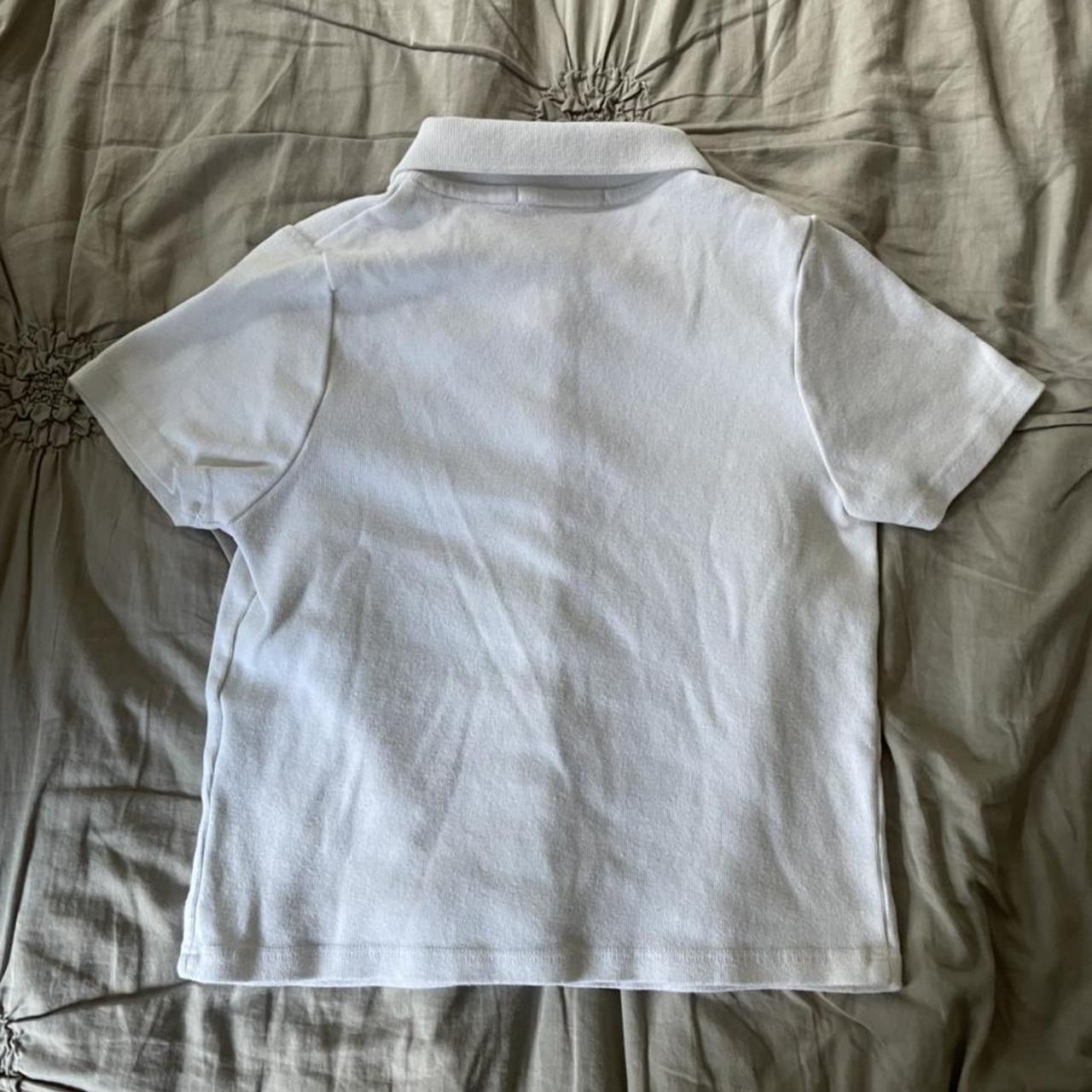 BRANDY MELVILLE BUTTON UP TOP i believe this is... Depop