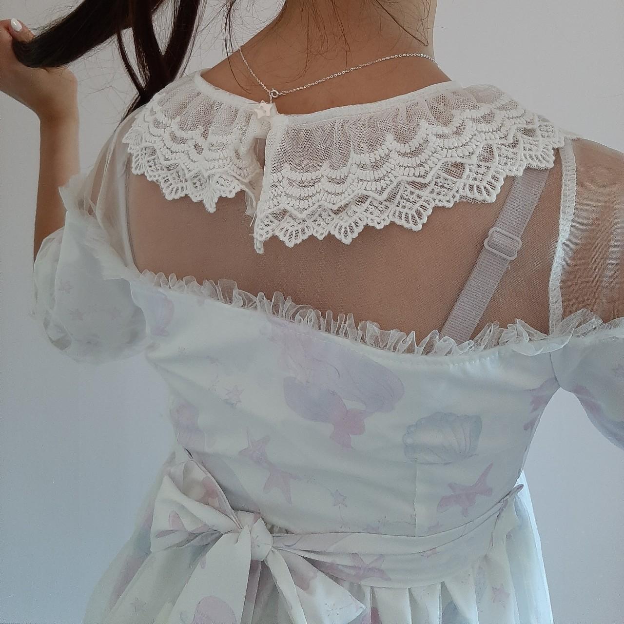 Mermaid vibe dress. Love it so much but I barely got... - Depop